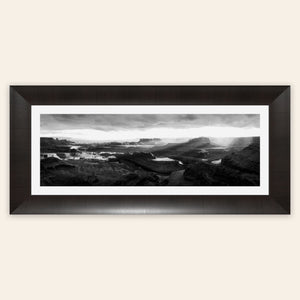 A framed piece of black and white panorama wall art from Dead Horse Point in Utah.