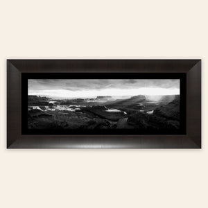 A framed piece of black and white panorama wall art from Dead Horse Point in Utah.