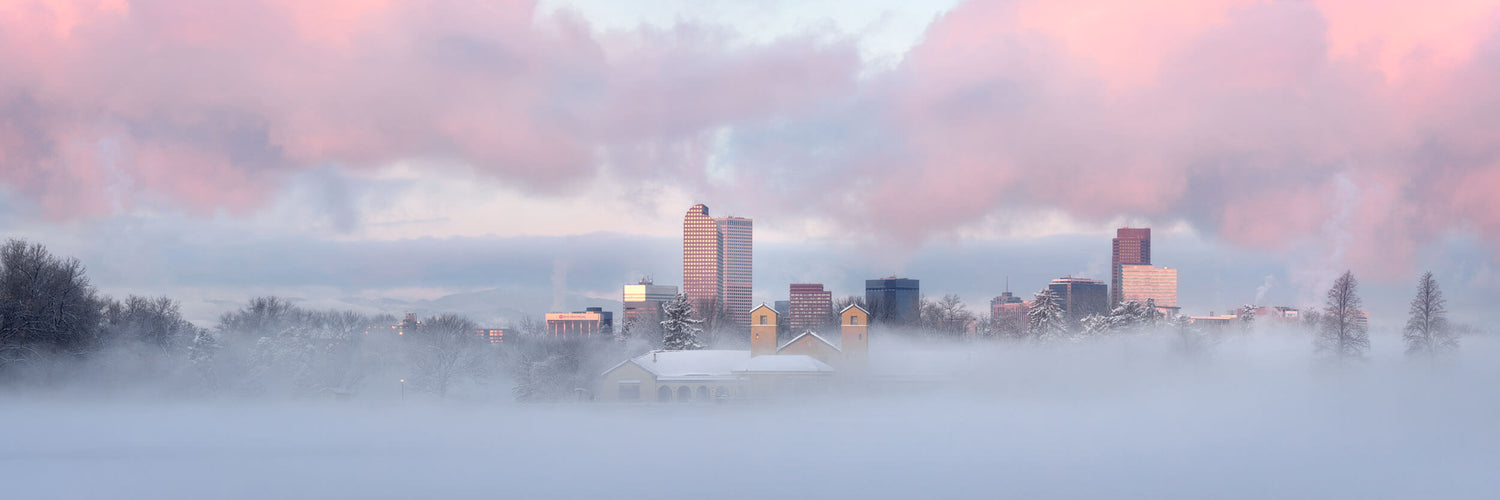 A picture of Denver City Park during a sunrise in winter.