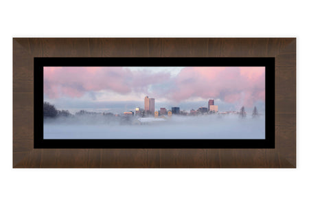 A framed picture of Denver City Park during a sunrise in winter.