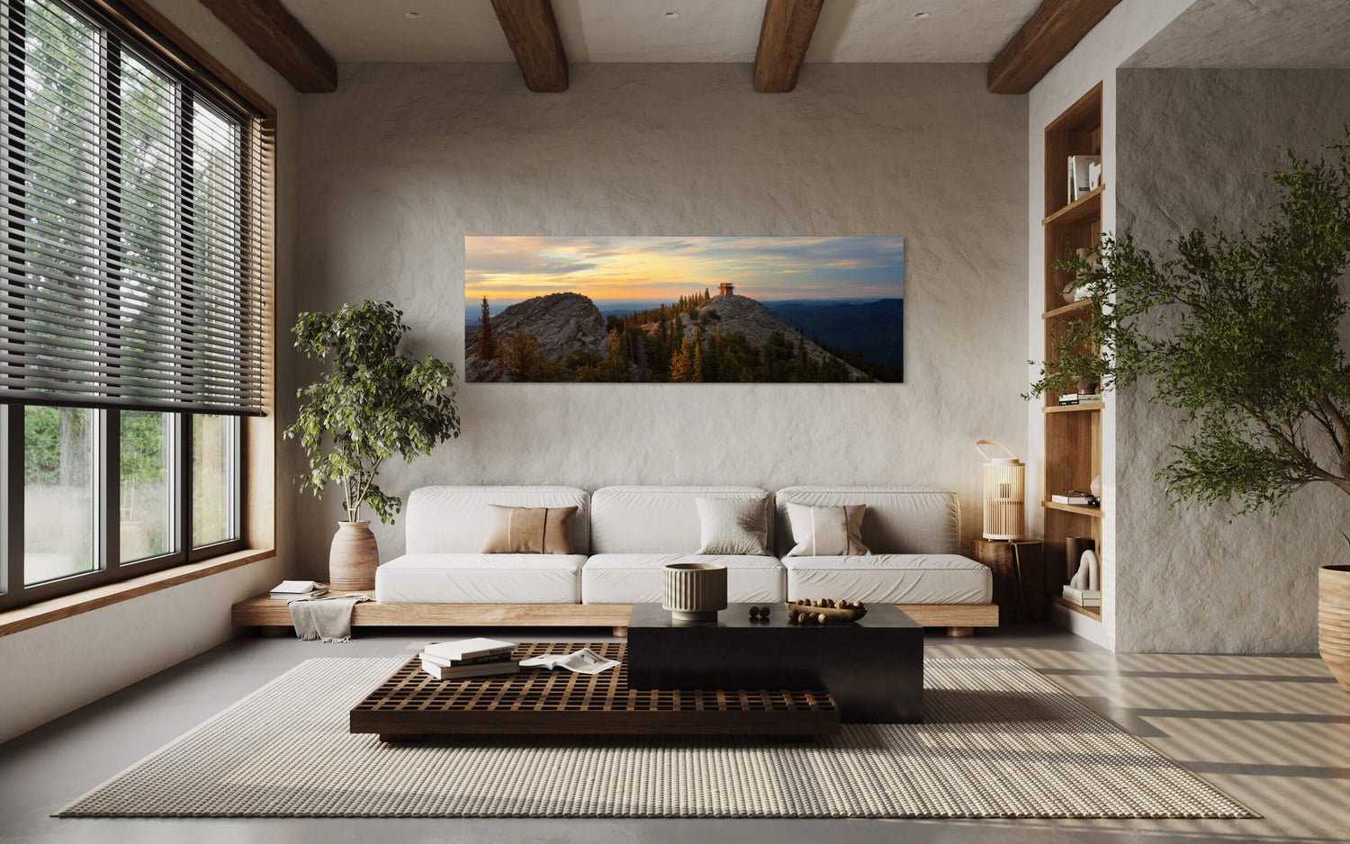 A piece of Denver art showing a fire lookout picture hangs in a living room.