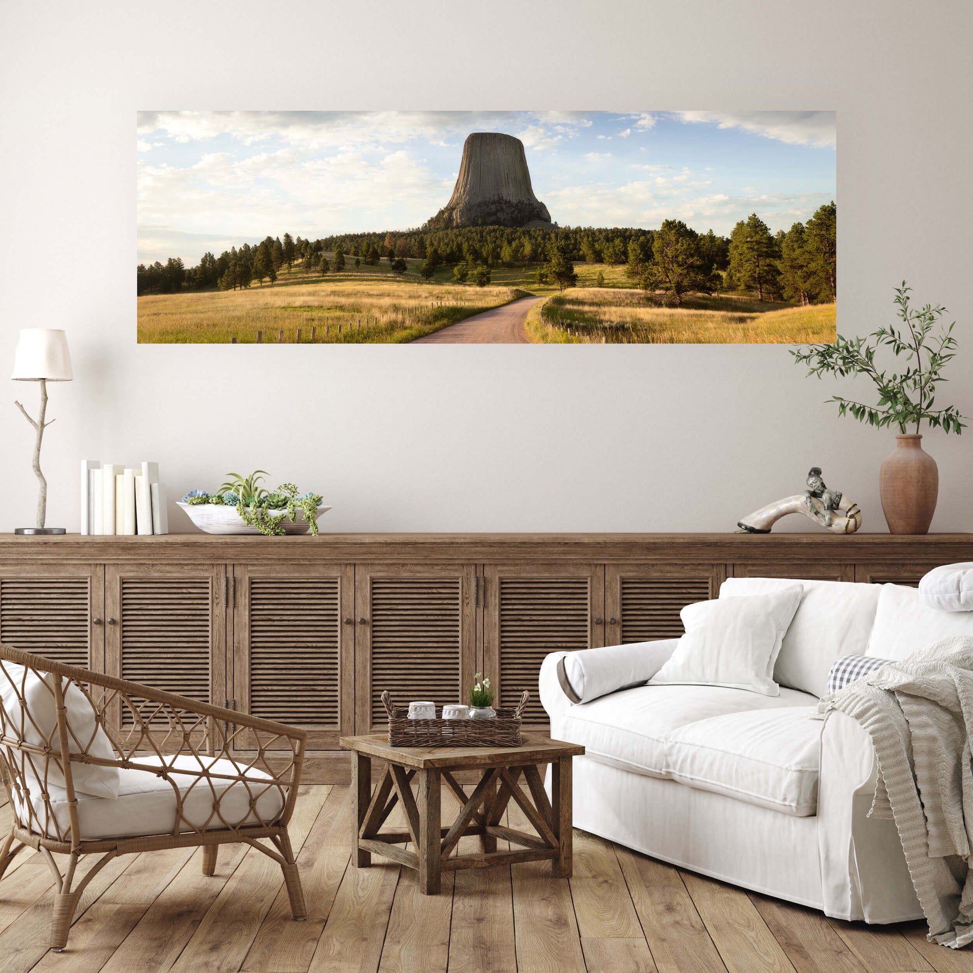 A Devil's Tower National Monument picture showing one of the trails in Wyoming hangs in a living room.