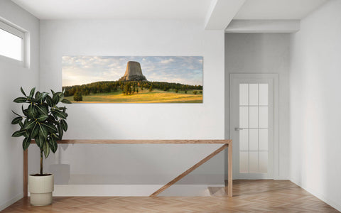 A Devil's Tower National Monument picture at sunrise in Wyoming hangs in an entryway.