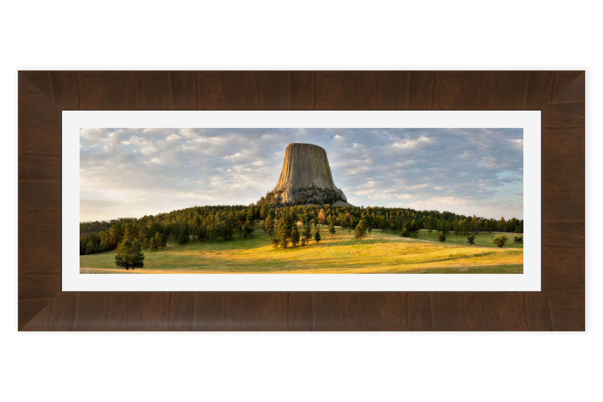 A framed Devil's Tower National Monument picture at sunrise in Wyoming.