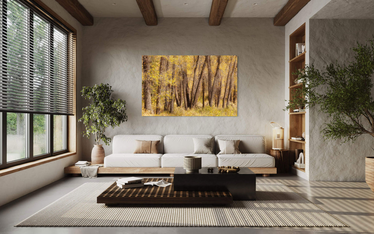 A piece of Jackson Hole art showing fall colors in Grand Teton National Park hangs in a living room.