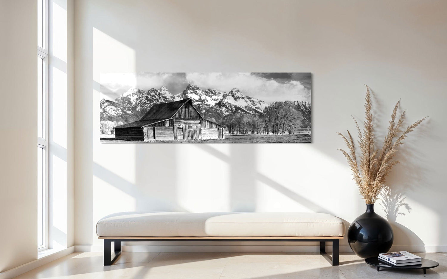 A piece of black and white wall art from Grand Teton National Park hangs in an entryway.