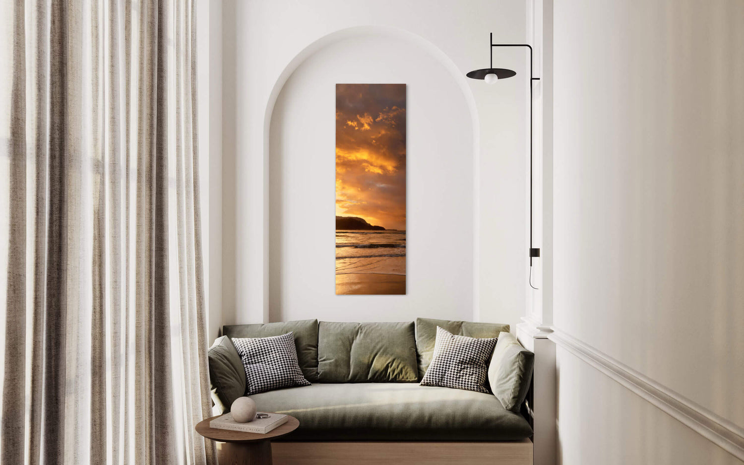 A Hanalei sunset picture from Kauai hangs in a living room.