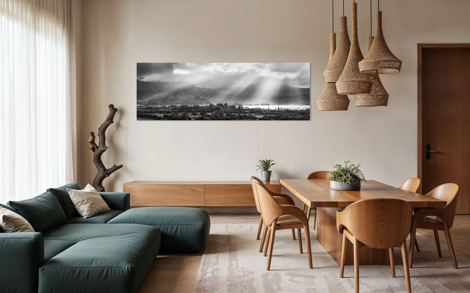 A piece of Hanalei black and white Kauai art hangs in a dining room.