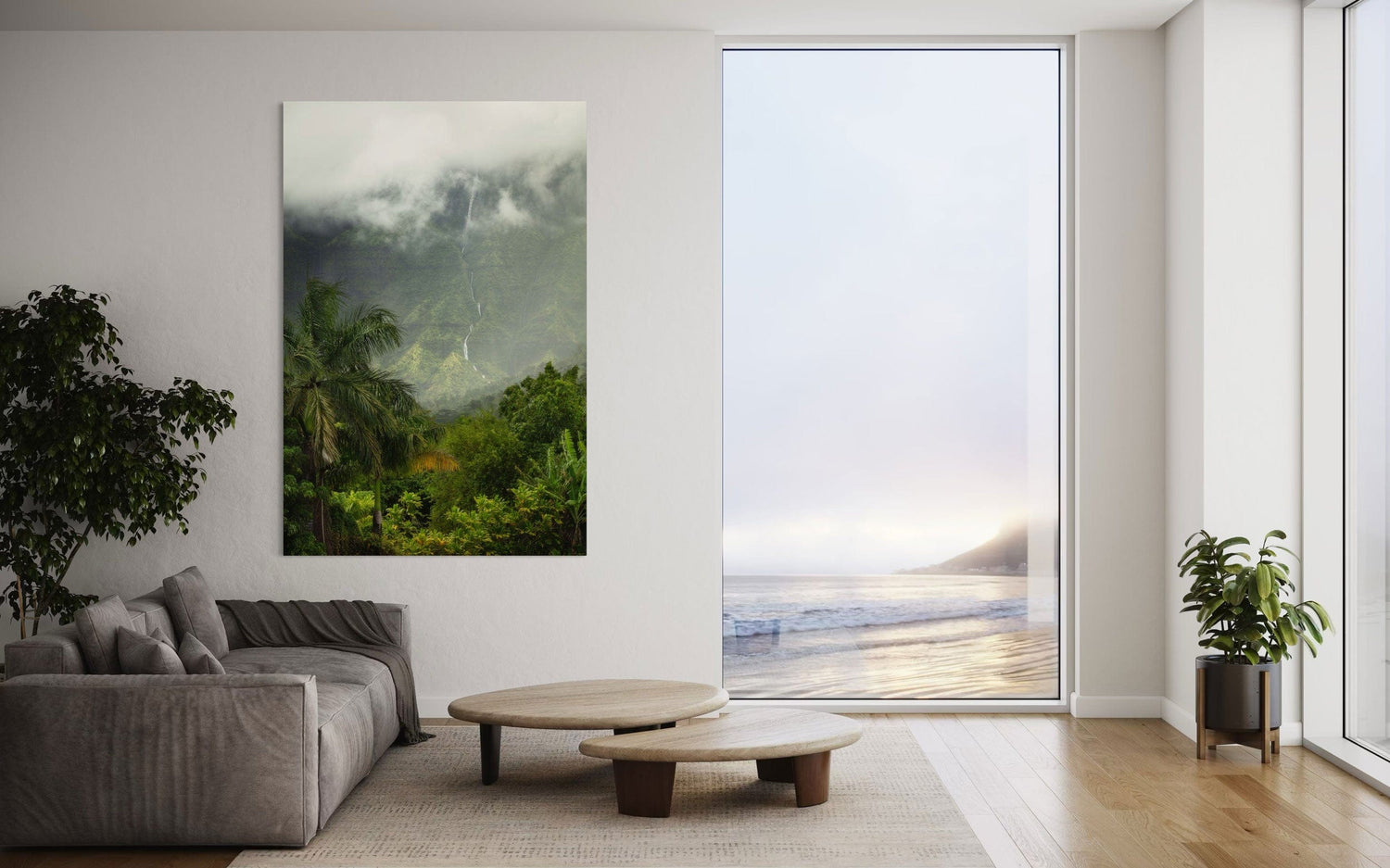 A piece of Kauai art showing the mountains seen from Hanalei hangs in a living room.