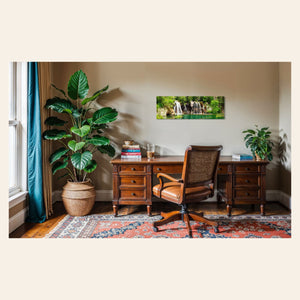 A piece of Colorado art showing a photo of the Hanging Lake waterfall hangs in an office.