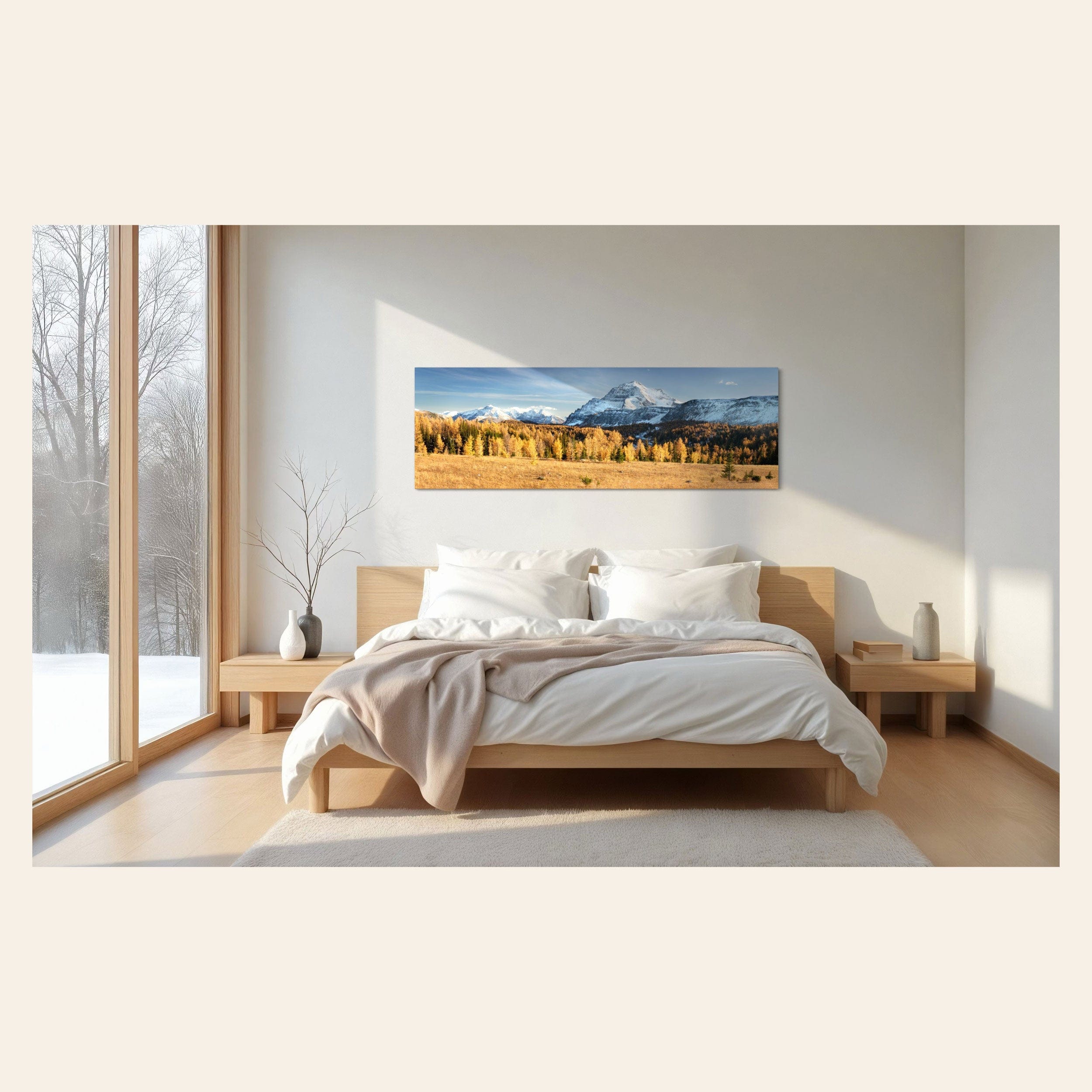 A piece of Banff art showing the larches on the Healy Pass hike in fall hangs in a bedroom.