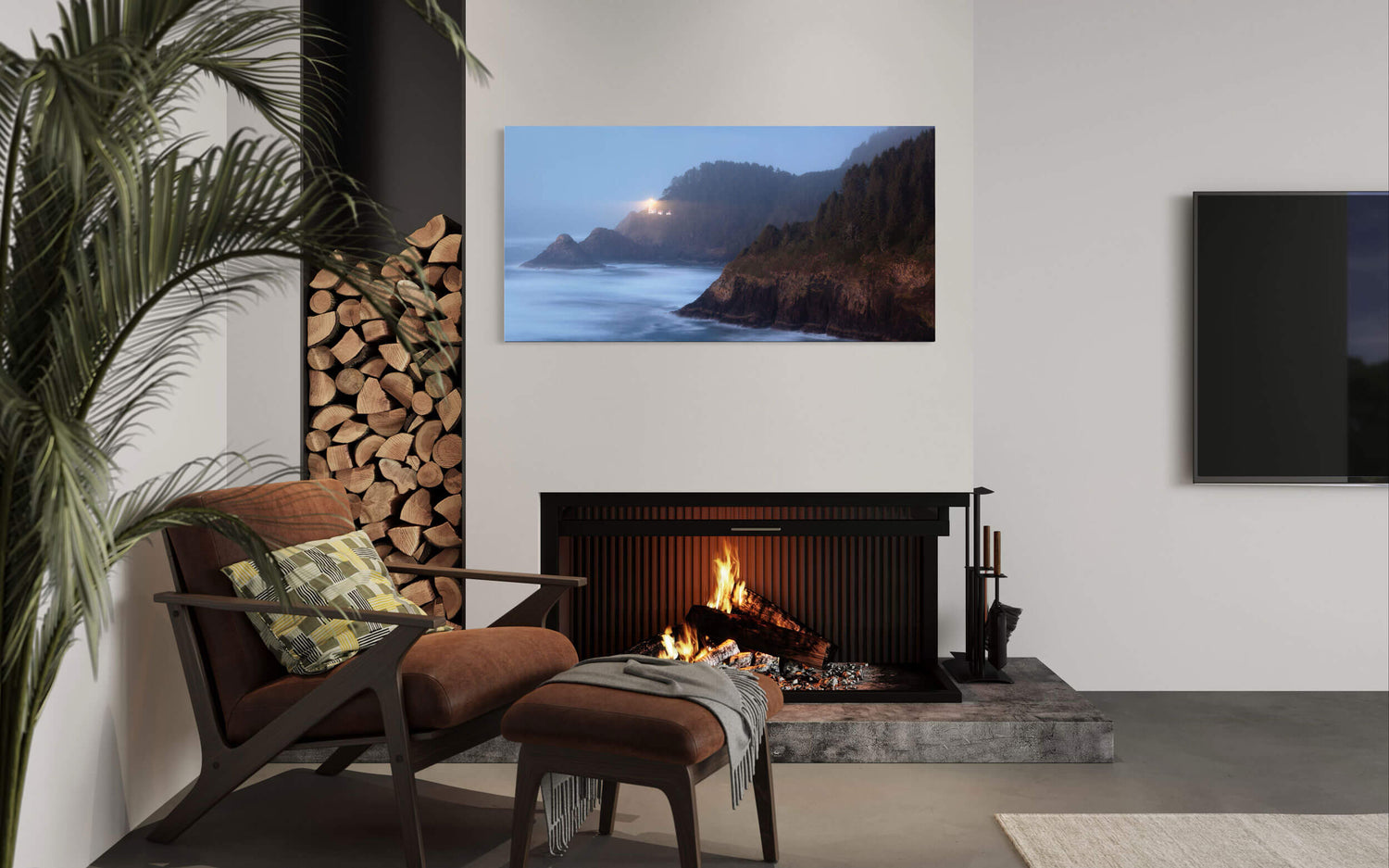 A lighthouse picture of Heceta Head on the Oregon Coast hangs in a living room.