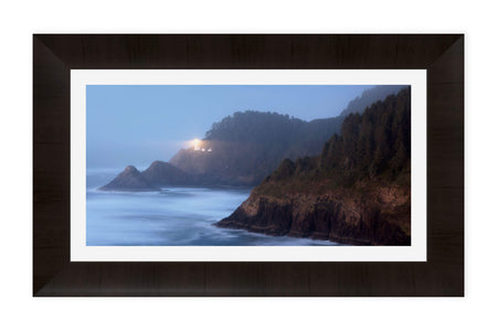 A framed lighthouse picture of Heceta Head on the Oregon Coast.