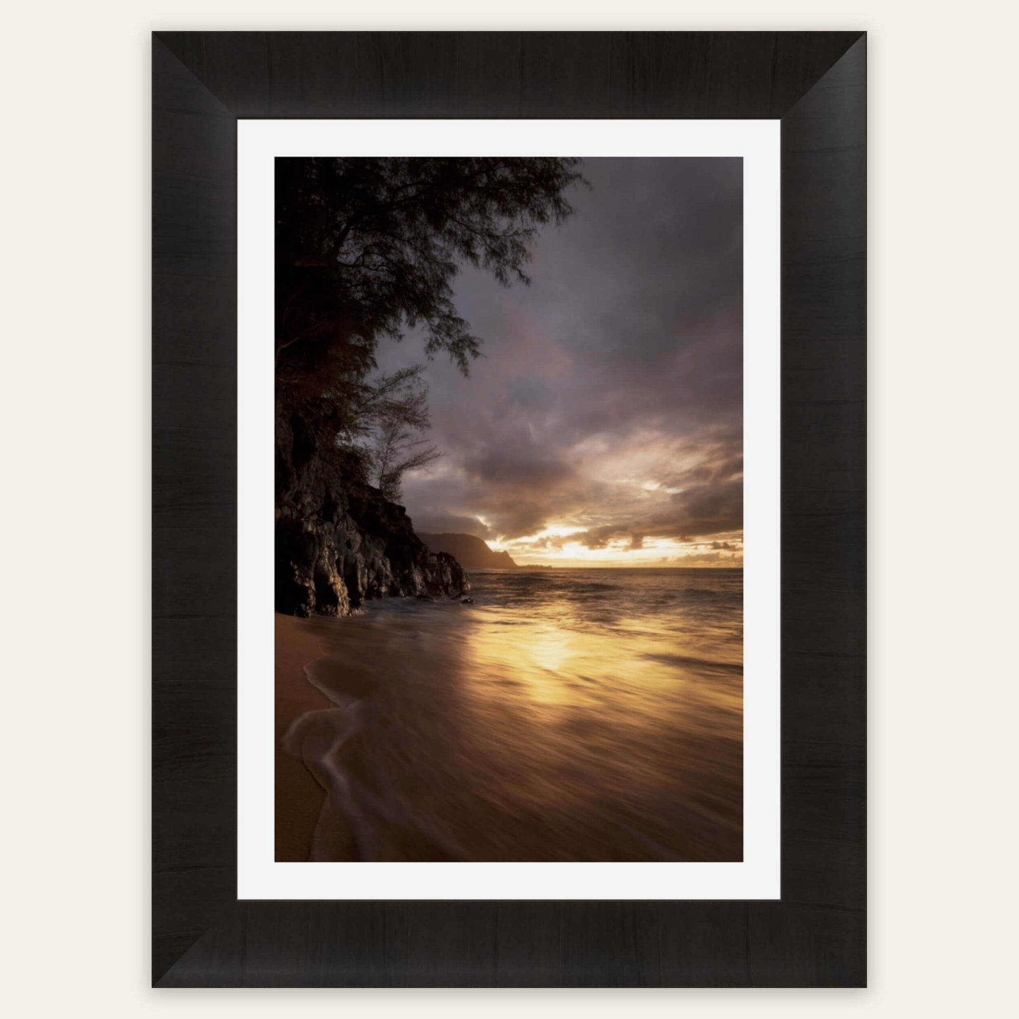 A framed sunset picture from Hideaway Beach in Princeville, Kauai.