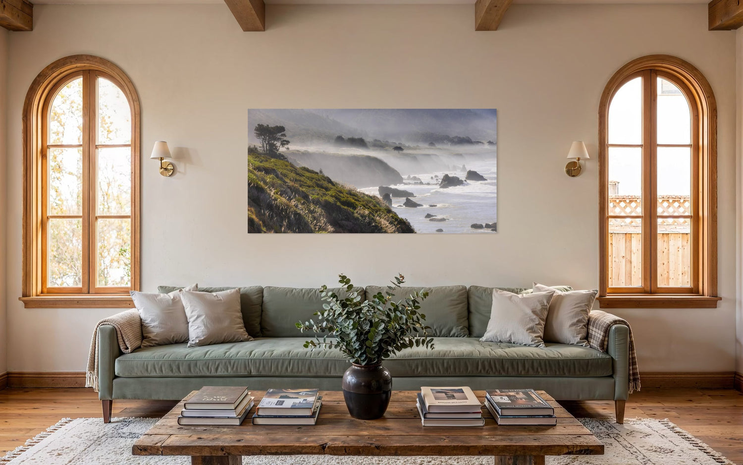 A Highway 1 photo from California hangs above a couch. | Lars Gesing Fine Art | Coastal Wall Art