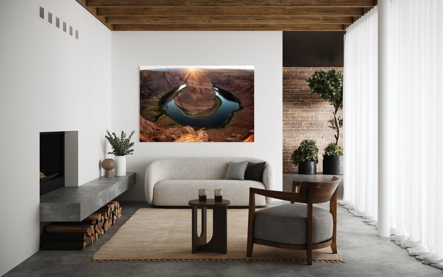 A piece of Arizona art showing a Horseshoe Bend sunset picture hangs in a living room.