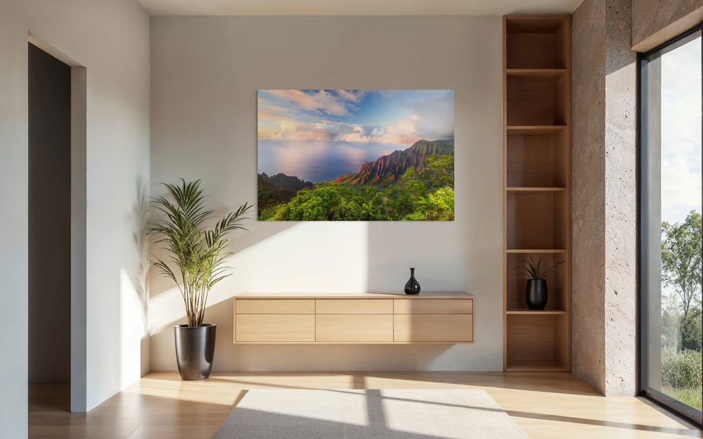 A piece of Kauai art showing a photo of sunset at the Napali Coast as seen from the Kalalau Valley Overlook hangs on a wall in a contemporary home.