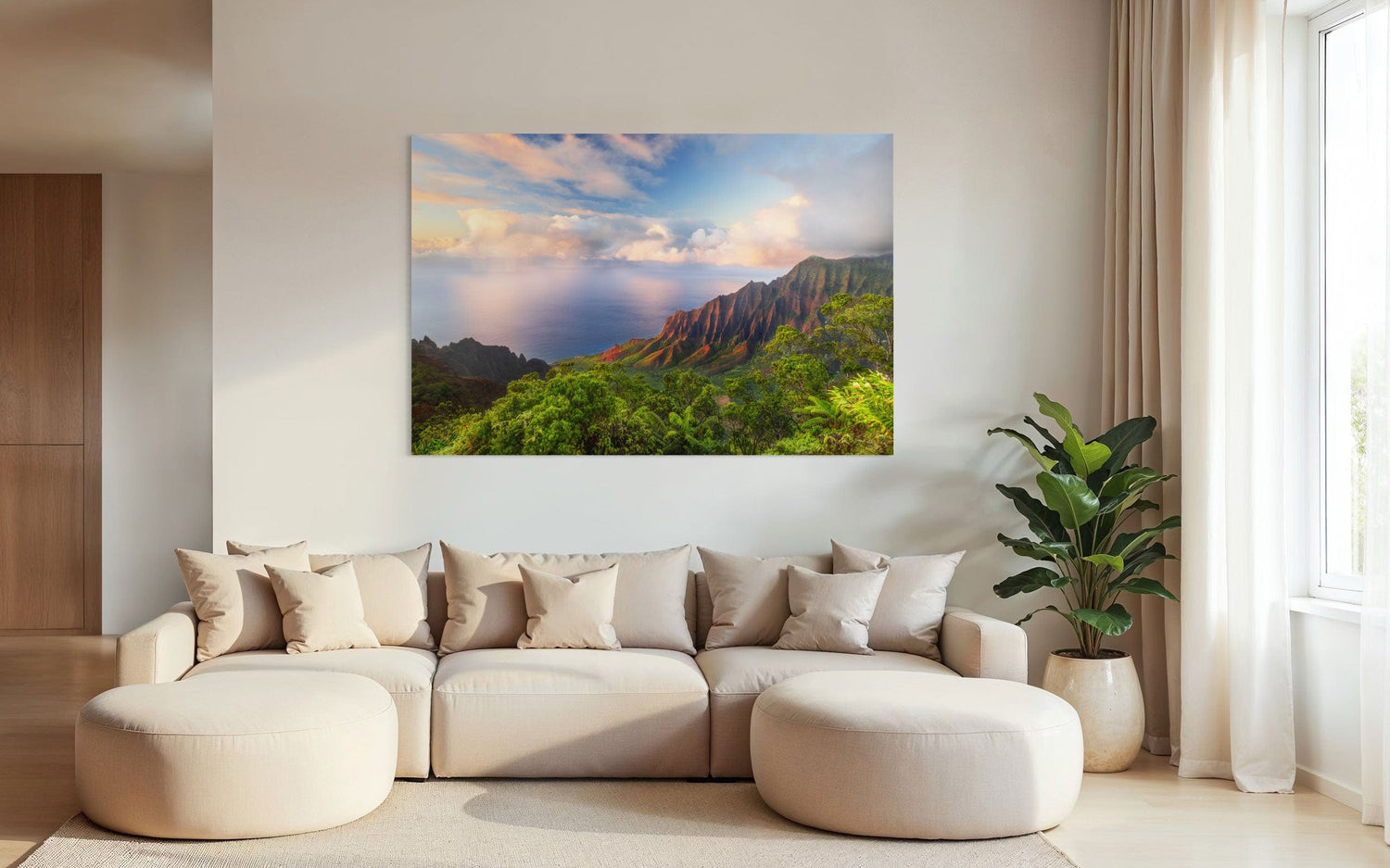 A piece of Kauai art showing a photo of sunset at the Napali Coast as seen from the Kalalau Valley Overlook hangs in a family room.
