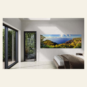 A Napali Coast picture shows the Kalalau Valley on Kauai hangs in a bedroom.