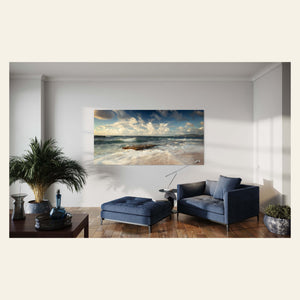 A Kauai sunrise picture from near Kapa'a hangs in a living room.