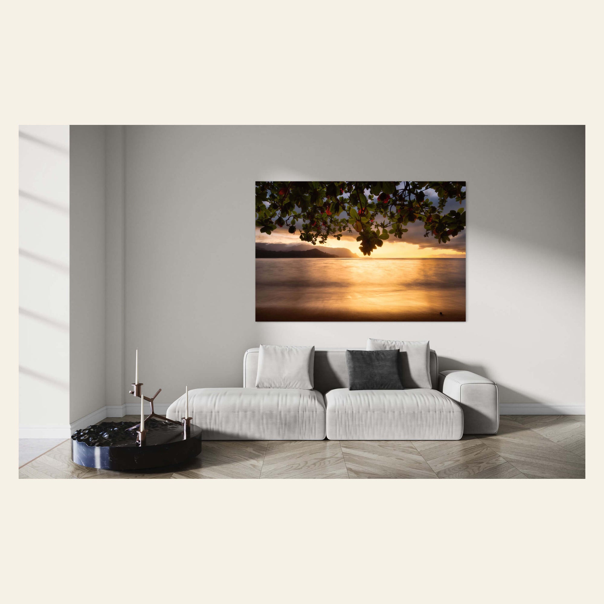 A picture of Pu'u Poa Beach at the Hanalei Bay Resort in Kauai hangs in a living room.