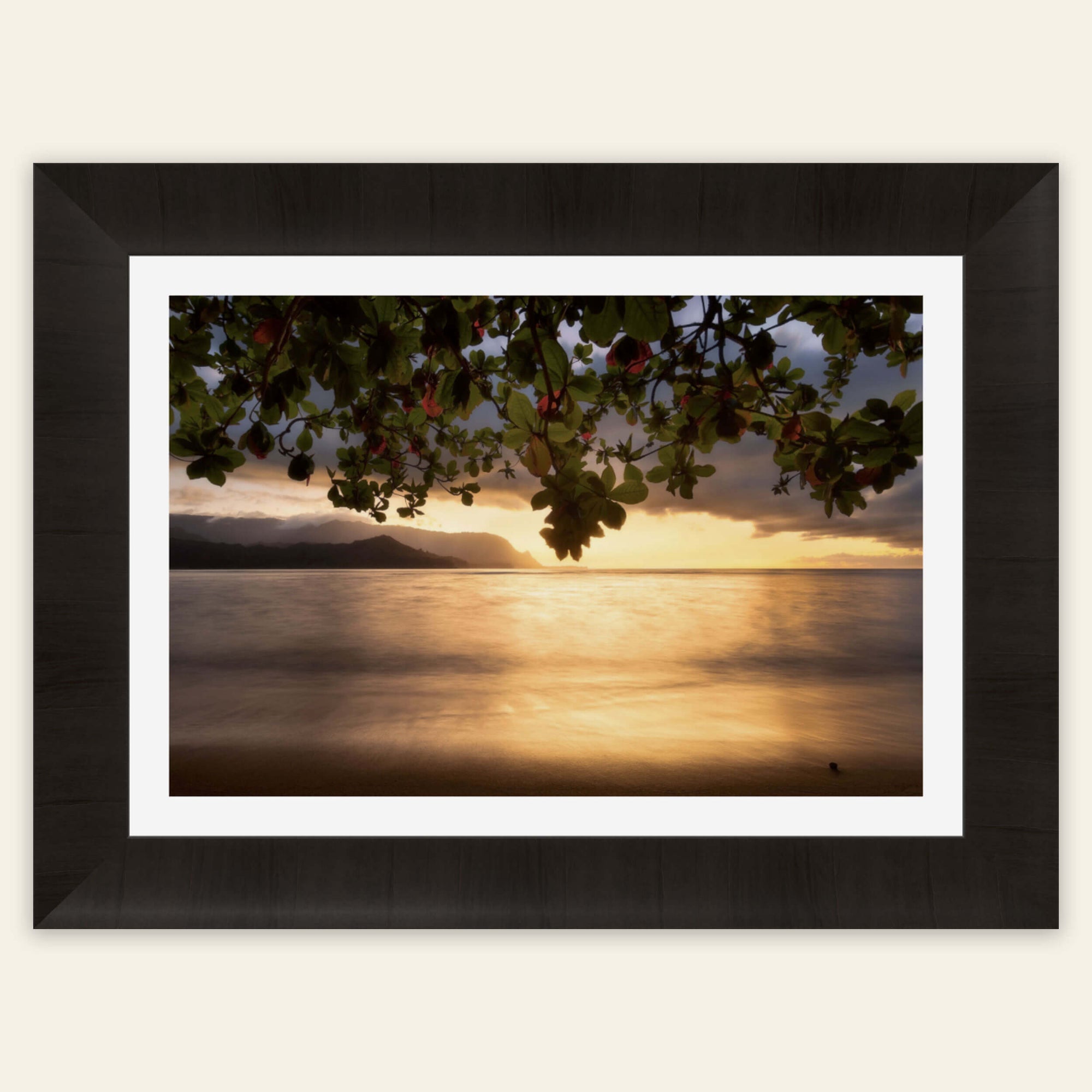 A framed picture of Pu'u Poa Beach at the Hanalei Bay Resort in Kauai.