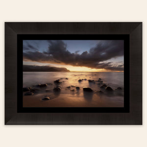 A framed Hanalei Bay sunset picture from Kauai.