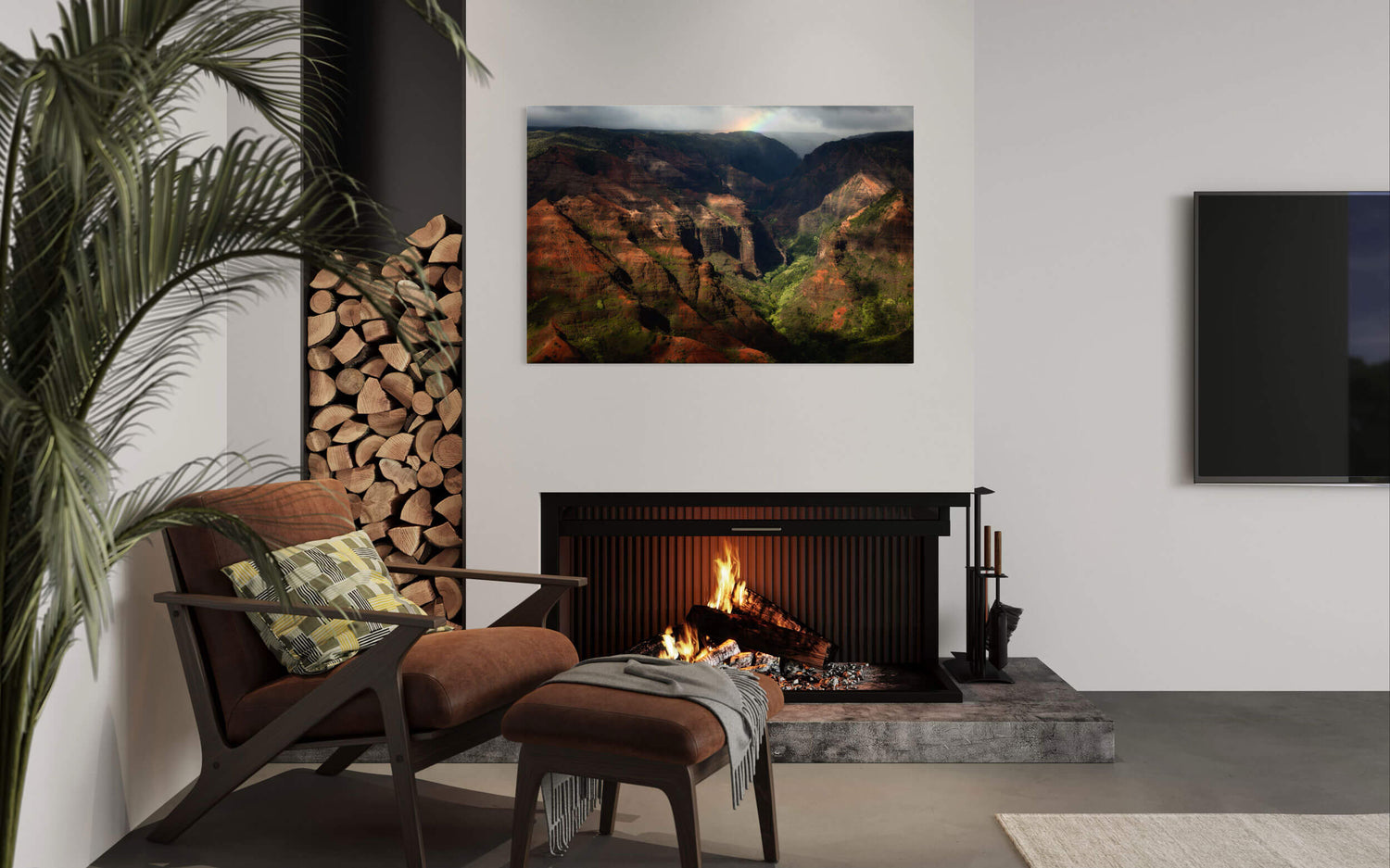 A piece of Kauai art showing photography of Waimea Canyon hangs in a living room.
