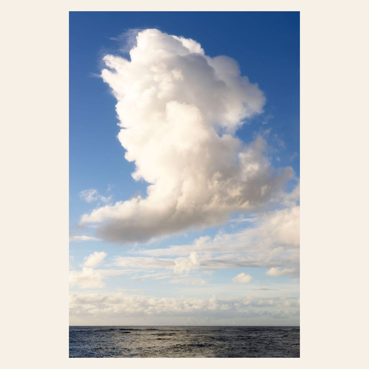 A piece of Kauai art shows a cloud photo over the ocean.
