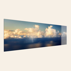 A piece of TruLife acrylic Kauai art shows a photo of clouds along the Napali Coast.