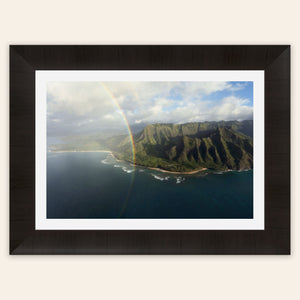 A framed piece of Napali Coast wall art created on a Kauai helicopter tour.