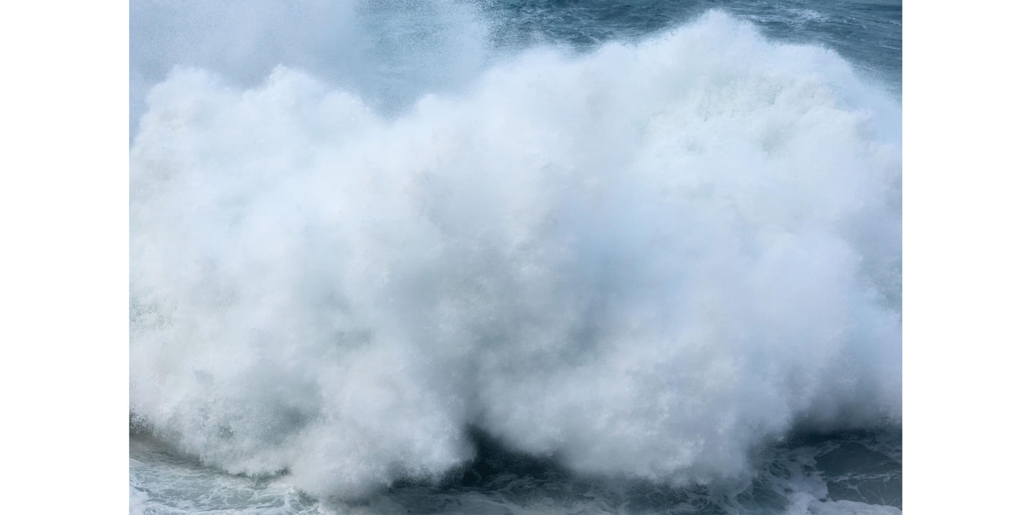 A wave picture of a powerful winter swell hitting Kauai's North Shore.