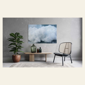 A wave picture of a winter swell on Kauai's North Shore hangs in a living room.