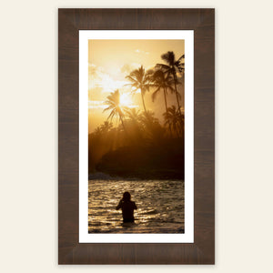 A framed Kauai sunset picture from the Coconut Coast.