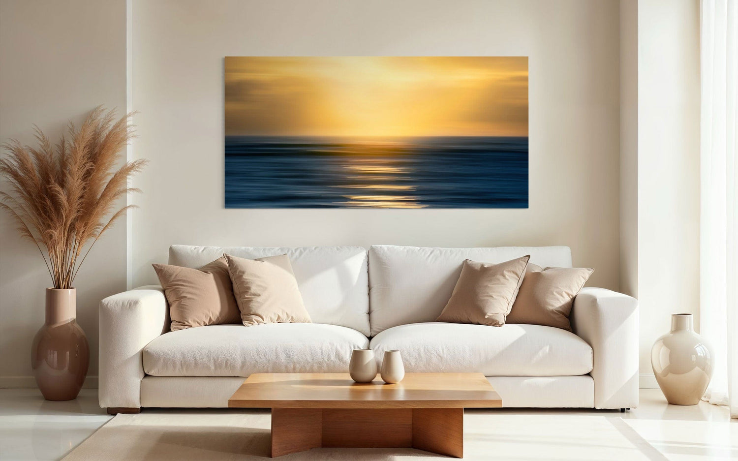 A piece of art showing one of the many good Kauai sunsets hangs in a living room.