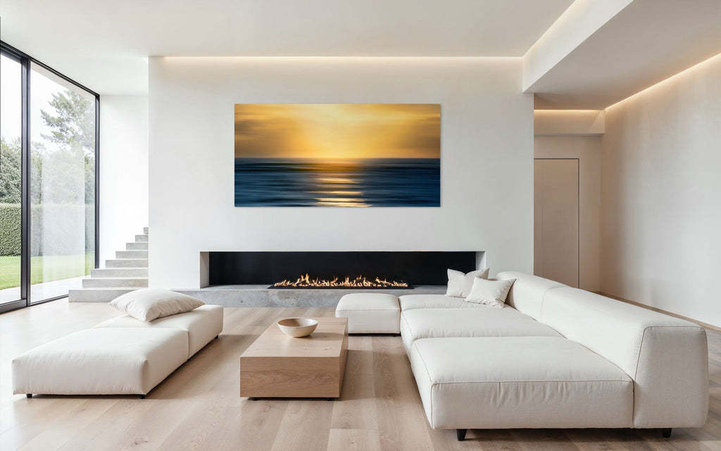 A piece of art showing one of the many good Kauai sunsets hangs above a fireplace.