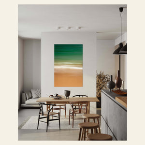 An abstract Kauai water ocean photograph hangs in a living room.