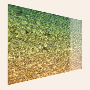 A piece of Kauai art shows the colors of the water on the water surface.