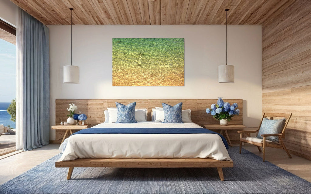 A piece of Kauai art showing the colors of the water on the ocean surface hangs in a master bedroom.