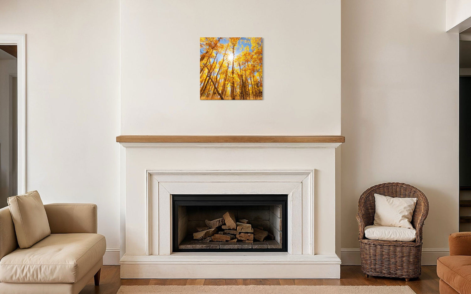 A piece of Colorado art showing a Kenosha Pass peak fall color photo hangs above a fireplace.