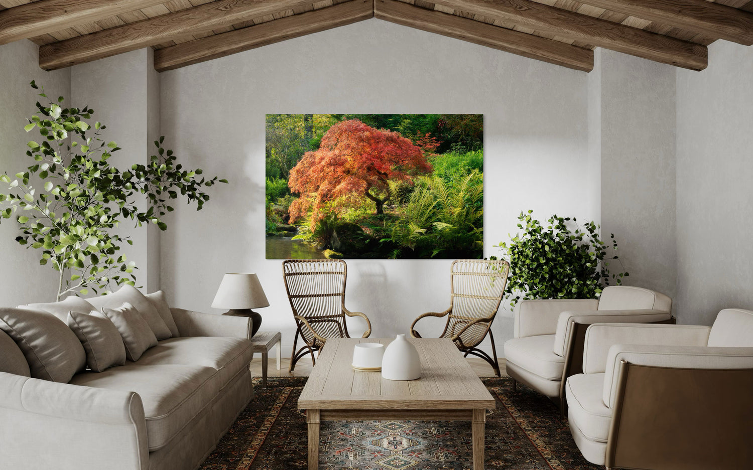 A piece of Seattle wall art showing a Japanese maple tree picture at Kubota Garden hangs in a living room.