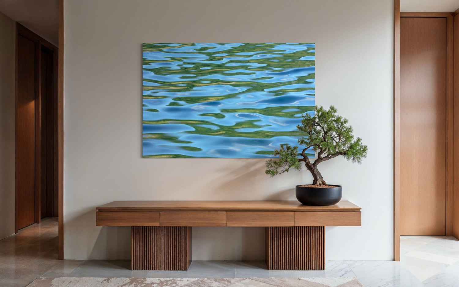 A piece of Washington art showing a Lake Sutherland photo hangs in an entryway.