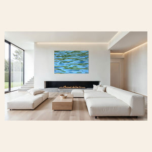 A piece of Washington art showing a Lake Sutherland photo hangs over a fireplace.