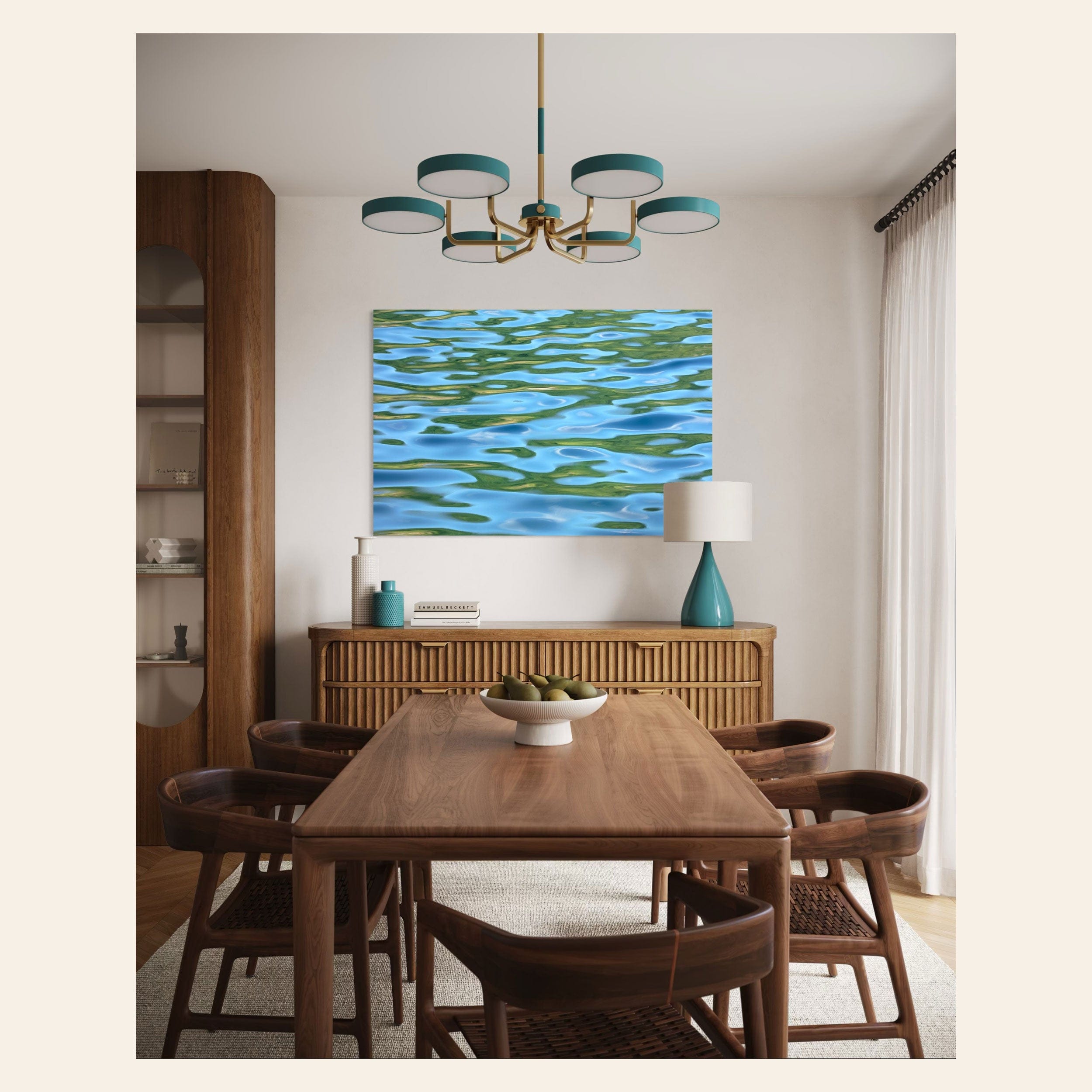 A piece of Washington art showing a Lake Sutherland photo hangs in a dining space.