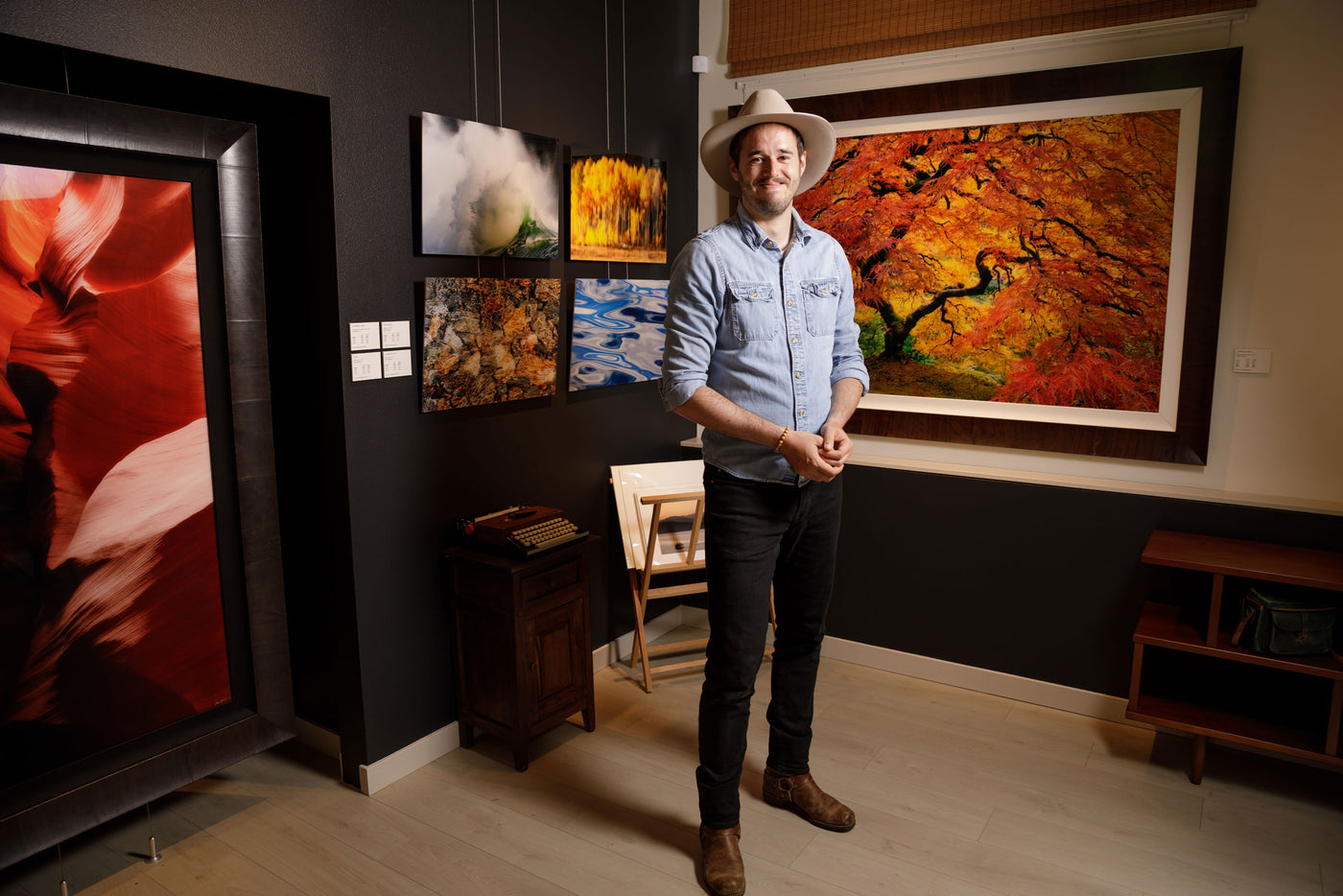 Lars Gesing in his Seattle photography gallery where he offers fine art nature and landscape photography prints for sale.
