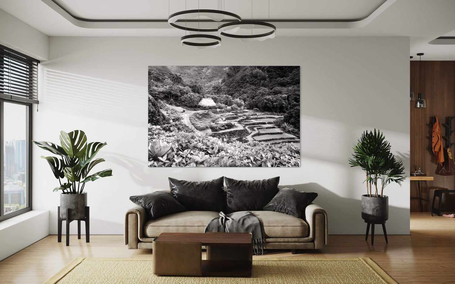 A black and white picture from Limahuli Garden on Kauai hangs in a living room.