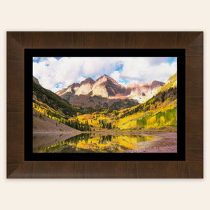 Stunning framed artwork of the Maroon Bells in Aspen during fall.