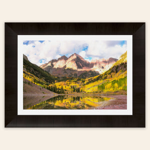 Stunning framed artwork of the Maroon Bells in Aspen during fall.