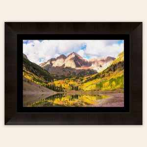 Stunning framed artwork of the Maroon Bells in Aspen during fall.