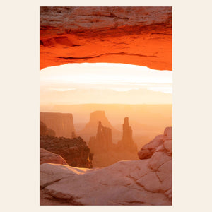 A piece of Moab art shows a Mesa Arch picture at sunrise